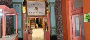 a building with a sign that reads hotel reupholka at Hotel Republica in Mexico City