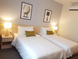 Letto o letti in una camera di The View Hotel