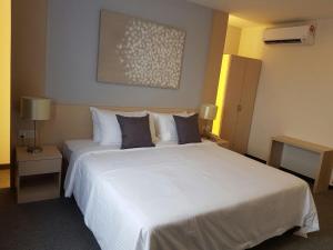 Letto o letti in una camera di The View Hotel