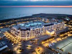 an aerial view of a hotel with the ocean in the background at Sea Breeze Baku in Baku