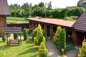 an aerial view of a house with a garden at Елізабет 1 in Svityazʼ +10 photos
