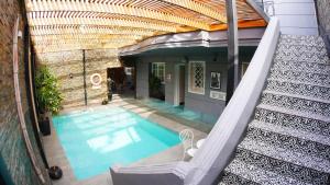 an overhead view of a swimming pool in a house at Tremo Bellavista in Santiago