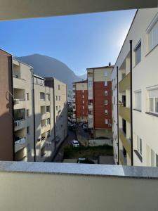 a view from the balcony of an apartment building at Adora's Apartment in Peje