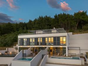 an aerial view of a house with a swimming pool at NS Luxury Villas in Podstrana