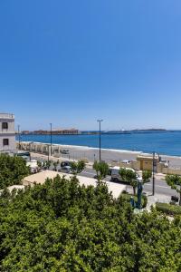 a view of a beach and the water at Alexander Seaview Haven in Ermoupoli