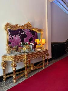 a room with a table with a map on the wall at Salon Boyer in Épernay