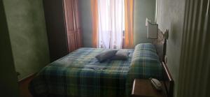 Llit o llits en una habitació de Hotel Natros