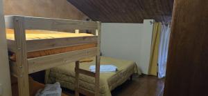 Llit o llits en una habitació de Hotel Natros