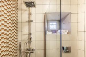 Koupelna v ubytování Olga Hotel Mouresi + 37 fotografií
