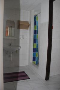Ванна кімната в Penzion Gentiana