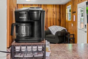 a coffee maker sitting on top of a counter at Nantahala Ridge in Bryson City