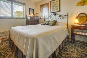 a bedroom with a large bed in a room at Unique Home w/ Beautiful Mtn Views! in Sequim
