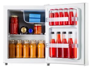 an open refrigerator filled with lots of drinks at Torre Florio in Campofelice di Roccella +29 photos