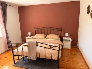 a bedroom with a bed and two night stands at Apartment Ivana in Murter +17 photos