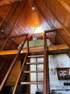 an overhead view of a loft in a cabin at Chalé Refúgio do Lobo in São Bento do Sapucaí +16 photos