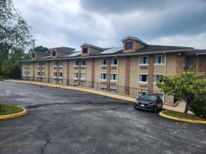 a parking lot in front of a large building at The Boardwalk Inn in Branson