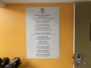 a white menu hanging on a wall at The Boardwalk Inn in Branson +18 photos