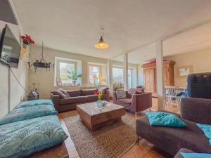 a living room with a couch and a table at Zum Anker in Bernkastel-Kues