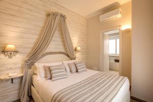 Postel nebo postele na pokoji v ubytování Casa Mia Vaticano Guest House