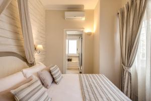 Postel nebo postele na pokoji v ubytování Casa Mia Vaticano Guest House
