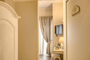 TV a/nebo společenská místnost v ubytování Casa Mia Vaticano Guest House