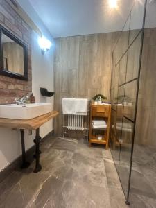 a bathroom with a sink and a shower at Abbey Green Farm in Wem +80 photos