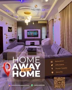 a home away from home living room with purple furniture at Velaris Luxury Apartment in Port Harcourt