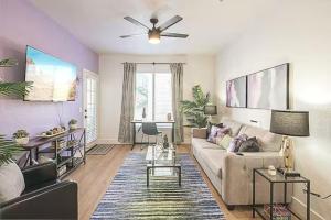 a living room with a couch and a table at Remodeled King Bed Suite Sonoran Sunset Lounge in Scottsdale