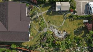 an overhead view of a backyard with a garden at Sarah's Small Garden in Cheonan +12 photos
