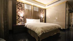 Letto o letti in una camera di Gold Sand Hotel