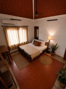 a bedroom with a large bed in a room at The cliff boutique in Varkala