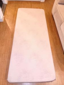 a white rug on the floor in a room at Flat Aeroporto Congonhas in São Paulo