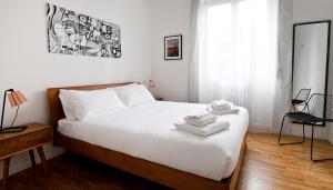 Кровать или кровати в номере Italianway-Scarlatti