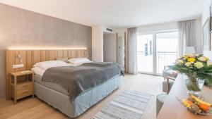 מיטה או מיטות בחדר ב-Hensens Residenz