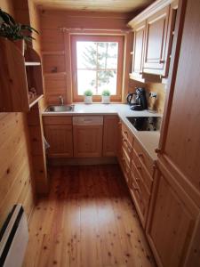 Kuchyň nebo kuchyňský kout v ubytování Chalet Kornock