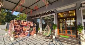 a store front with a sign in front of it at Hotel gl palace & restaurant chomu in Jaipur +2 photos