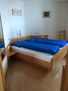 Postel nebo postele na pokoji v ubytování Joglerhof