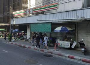 a group of people walking in front of a store at 2BR Duplex in central Chitlom in Bangkok