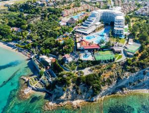 an aerial view of a resort next to the ocean at Sealight Resort Hotel in Kuşadası
