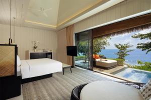 a bedroom with a view of the ocean at Hyatt Regency Koh Samui in Chaweng +83 photos