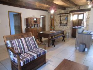 Posezení v ubytování Gîte à la ferme + 8 fotografií