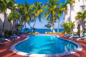 The swimming pool at or close to Chrisanns Paradise Suite by the Ocean - Apt#9