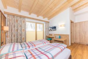 Postel nebo postele na pokoji v ubytování Haus Fidelis Riml