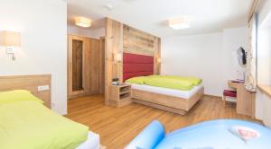 Postel nebo postele na pokoji v ubytování Haus Fidelis Riml