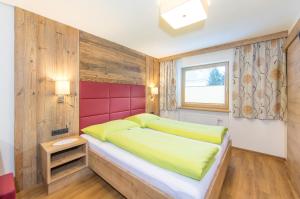 Postel nebo postele na pokoji v ubytování Haus Fidelis Riml