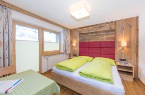 Postel nebo postele na pokoji v ubytování Haus Fidelis Riml