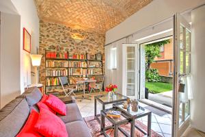 a living room with a couch and a table at Casa Tamè - Happy Rentals in Melide
