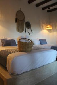 Postel nebo postele na pokoji v ubytování Tierra Mia Boutique Hotel