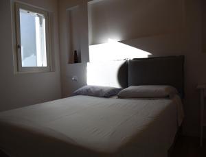 Postel nebo postele na pokoji v ubytování Suite In Centro Storico