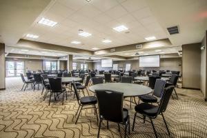 a large room with tables and chairs in it at Comfort Suites Hotel and Conference Center in Berlin +62 photos